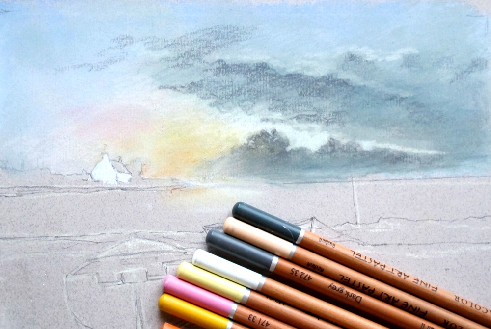 Sky refined with pastel pencils, warm orange glow strengthened, with the pencils laid alongside