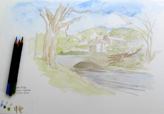 Applying the first light watercolour washes for the sky and landscape base layers. Applying the first light watercolour washes for the sky and landscape base layers.