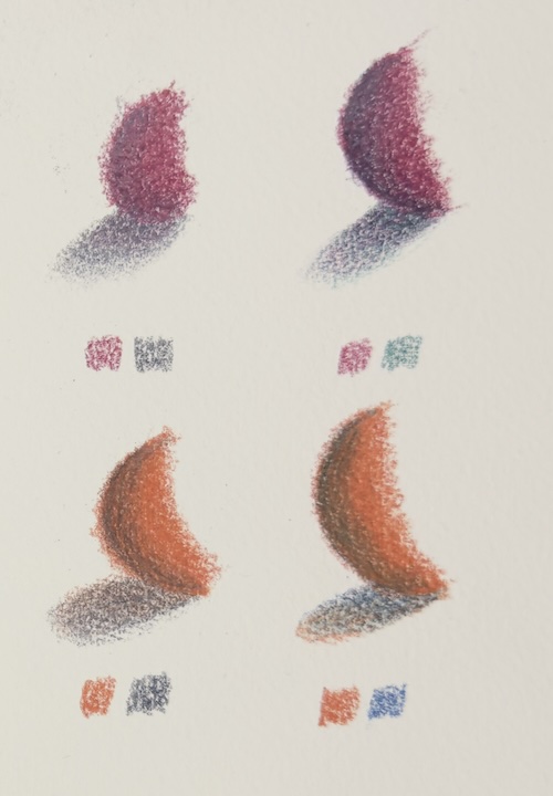 See the difference: Using complementary colours (right) creates more realistic coloured pencil shadows compared to using plain grey (left) on red and orange.