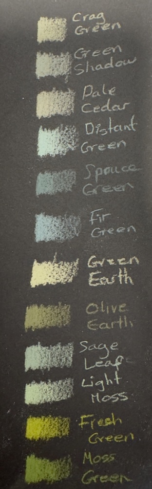 Swatches of the new Derwent Drawing green colours on black paper, including Crag Green, Spruce Green and Fir Green