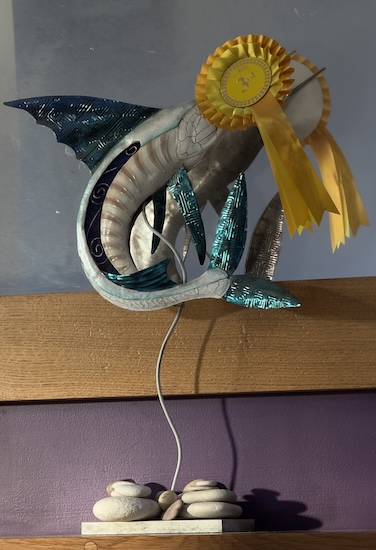metal marlin with dog show rosette