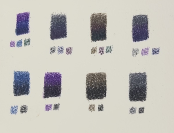Coloured pencil chart showing rich neutral dark mixes using blues, purples, and browns for realistic shadows.