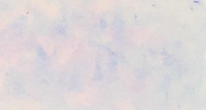 budget watercolour pencil shavings separating into different colours on wet paper