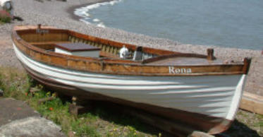 clinker-built river boat showing the full bow stern and waterline