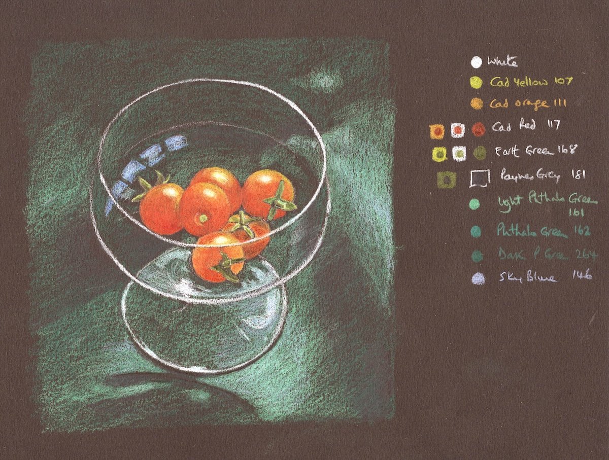 Finished coloured pencil drawing of a glass of tomatoes on black card, shown with the colour key