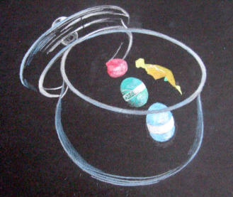 More sweets added to the jar, building up the composition